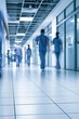 © Generative AI - Blurred medical staff walking down hospital corridor