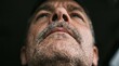 © Faye Visuals - Low angle extreme close up of mature man nose mustache and facial stubble