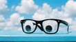© MSTRABEA - Funny concept of wide eyes looking through a pair of black framed glasses