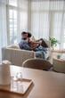 © Jovo Jovanovic/Stocksy - Father and daughter on a video call