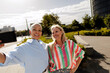 © AresStudio Belen y Carlos/Stocksy - Diverse women friends taking selfie with camera outdoors