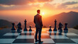 © Sherlock - Businessman standing on giant chessboard, facing sunset mountains, business strategy concept.