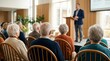 © Working Moments - Senior citizens attending an emotional wellness seminar in a bright indoor community center.
