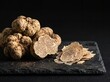 © DesignYoga - Priceless gourmet white truffle fungi served on black stone
