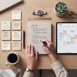 © Land of Light - Person planning schedule with sticky notes and calendar on wooden desk