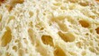 © Endin - Extreme close up of soft white bread crumb texture.