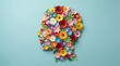 © KaziDalia - Profile head silhouette made of colorful paper flowers representing vibrant thoughts for world mental health day art.