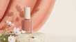 © Andre Jovi - Pink nail polish bottle on stone podium with flowers and silk drape
