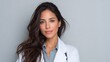 © Di Studio - hispanic woman doctor on light gray background