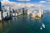 Miami skyline with coastal bay and shoreline. Miami aerial panorama with cityscape. Miami downtown skyline with towers. Miami seaside view with oceanfront.