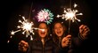 © kyme - People Holding Sparklers at Night.