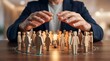 © CuteBee - Corporate leader protecting group of stylized wooden figurines with glowing lightbulb core and digital network connection lines representing team synergy and innovative business growth