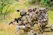 © Hip.hub - Military personnel train in a forested area during an exercise aimed at enhancing teamwork and skills