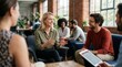 © Lamduan - A modern office where smiling coworkers are having a friendly discussion