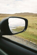 © Anna Karlova/Stocksy - Rural Landscape Reflected in Car Side Mirror