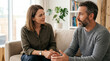 © filipe - Couple having serious conversation on sofa, indoor, natural light, bookshelf background.