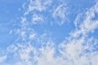 © CS Media - Full frame wispy cirrocumulus clouds framing blue sky copy space