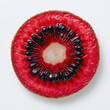 © Mst - A detailed close-up macro shot showing a vibrant red kiwi fruit cross section isolated