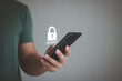 © MUNTHITA - Person using the smart mobile phone to access on smartphone for validate password for biometric two-step authentication to unlock security. Business Technology security Concept.