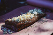 © Mat Hayward - Cooked pork ribs topped with butter cubes and brown sugar on butcher paper, ready to be wrapped after smoking.