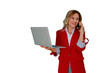 © Komora - Professional businesswoman in red blazer smiling, holding laptop, and making a phone call. Transparent background