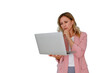 © Komora - Businesswoman thinking, looking at laptop with confused expression, working on a problem, transparent background