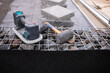 © Denis - Professional paving tile installation tools on outdoor construction site
