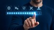 © abdul studio - IT administrator pressing a glowing digital progress bar interface visualizing system installation and software security update