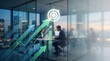 © Dara - A business professional sits at a desk in a modern office, reviewing data on a laptop. Several green arrows with upward trajectory graphs overlay the image, symbolizing growth and progress.