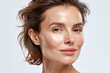© JoeyMarut - Glossy skin close up face three quarter angle focusing on facial contour natural makeup healthy complexion subtle smile confident expression