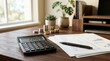 © Wannaeka - Cash flow forecasting and financial discipline concept featuring documents and a calculator.