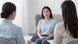 © TJAYZ - 194, An authentic therapy session showing a clinical psychologist listening empathetically, comfortable natural armchair, soft lighting, mental health care and empathy