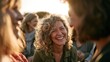 © ThuChung - Group of joyful mature female friends laughing together outdoors in warm golden sunlight during a cheerful gathering