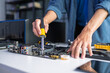 © Charlie's - IT Technician Fixing Desktop Computer PC Hardware for Troubleshooting Maintenance Upgrade and Modern Technology Support Services.