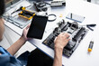 © Charlie's - IT Technician Fixing Desktop Computer PC Hardware for Troubleshooting Maintenance Upgrade and Modern Technology Support Services.