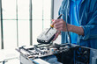 © Charlie's - Man Fixing and Repairing Desktop Computer PC Hardware Components During Professional Technology Maintenance Service.