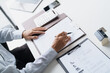 © Charlie's - Real Estate Broker Consulting Client About Home Insurance and Property Security During House Buying Process