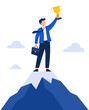 © tajimpranto - Successful businessman standing on top of a mountain holding a golden trophy as a symbol of achievement