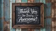 © Parvin - A rustic chalkboard sign with the handwritten message thank you for being awesome on a wooden background