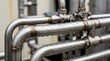 © Yahya - Industrial Metal Pipes with Water Droplets - Close-up Industrial Plumbing