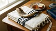 © Sain - Jewish shofar horn rests on white tallit prayer shawl. Traditional ritual objects for Rosh Hashanah, Yom