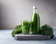 © Aaron - fresh organic kale juice bottle and glass on a stone stand for healthy nutrition