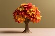 © Trendy Graphics - Decorative autumn paper tree with miniature origami maple leaves in warm colors