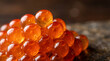 © cornelis - Close-up of glistening orange salmon roe, gourmet food delicacy