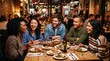 © Bruno Stock - Diverse group of friends laughing and enjoying a meal together at a restaurant with warm lighting