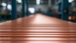 © Bonsales - Copper tubes extending along production line in industrial facility, manufacturing metal piping