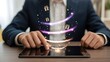 © Sumi - Businessman using a digital tablet with glowing gift icons for online shopping and festive holiday sales promotion concepts