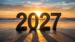 © MstNehar - New year 2027 on the beach with a dramatic sunset and ocean waves in background