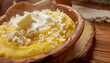 © Stanislava - Romanian Mămăligă with Cheese and Sour Cream