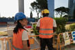 © AresStudio Belen y Carlos/Stocksy - Diverse construction workers supervising urban building site
